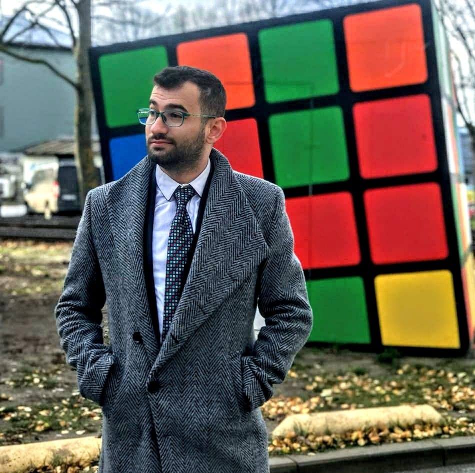 Mohammad Hijazi outdoors in a wool coat